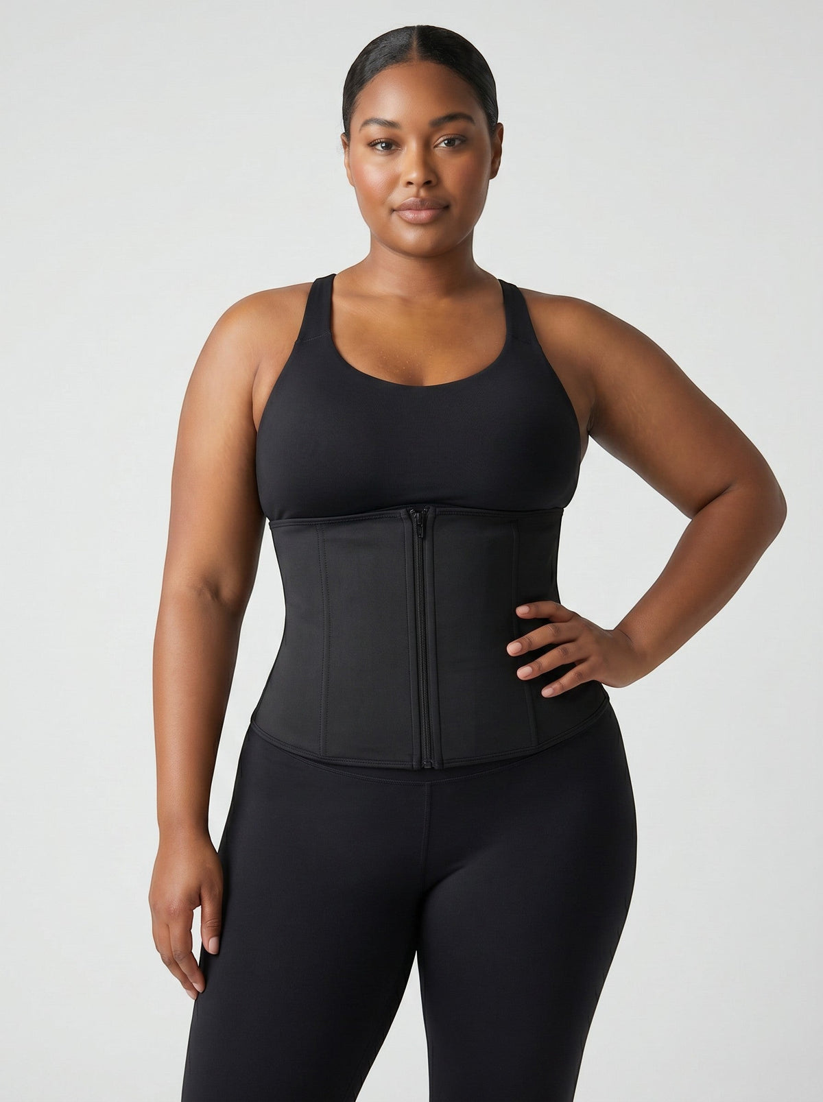 bys-store-3136505-215991 CoreBelt sauna waist trainer in black worn by a woman for workout compression and support
