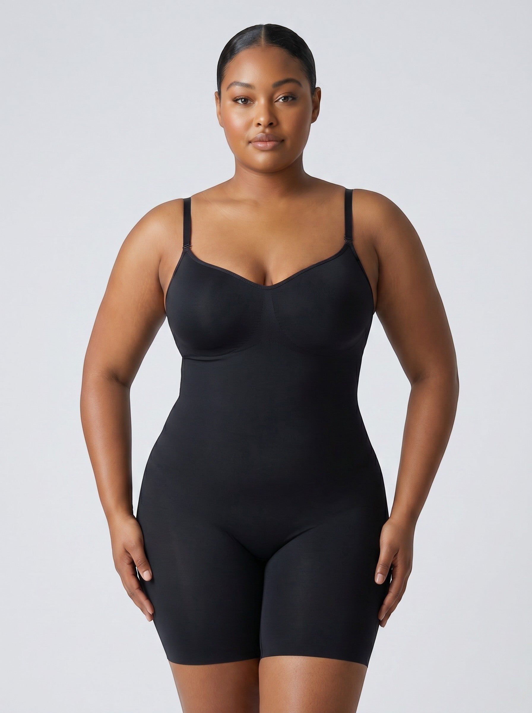 Model wearing a black seamless FormFit Bodysuit by bys-store-3136505-215991 for tummy control and full body shaping.