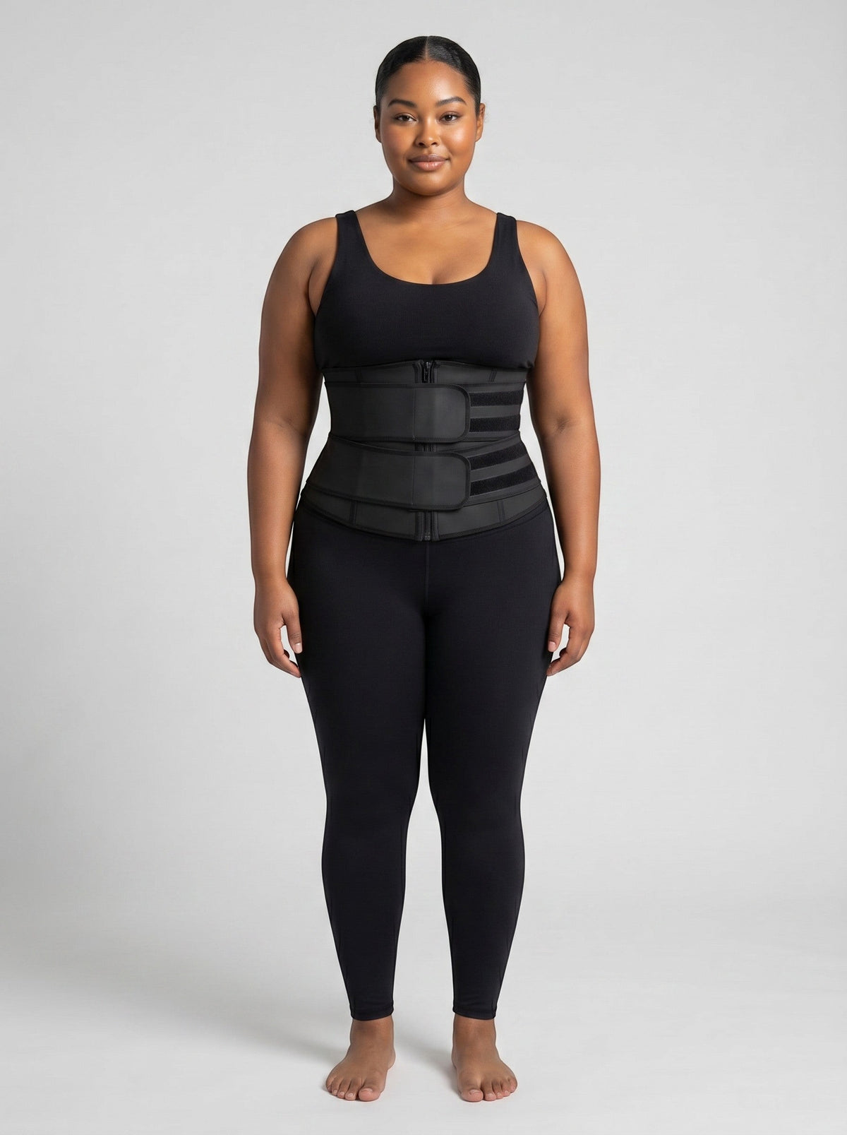 bys-store-3136505-215991 FlareBelt black waist trainer with double compression straps worn by a woman in gym gear