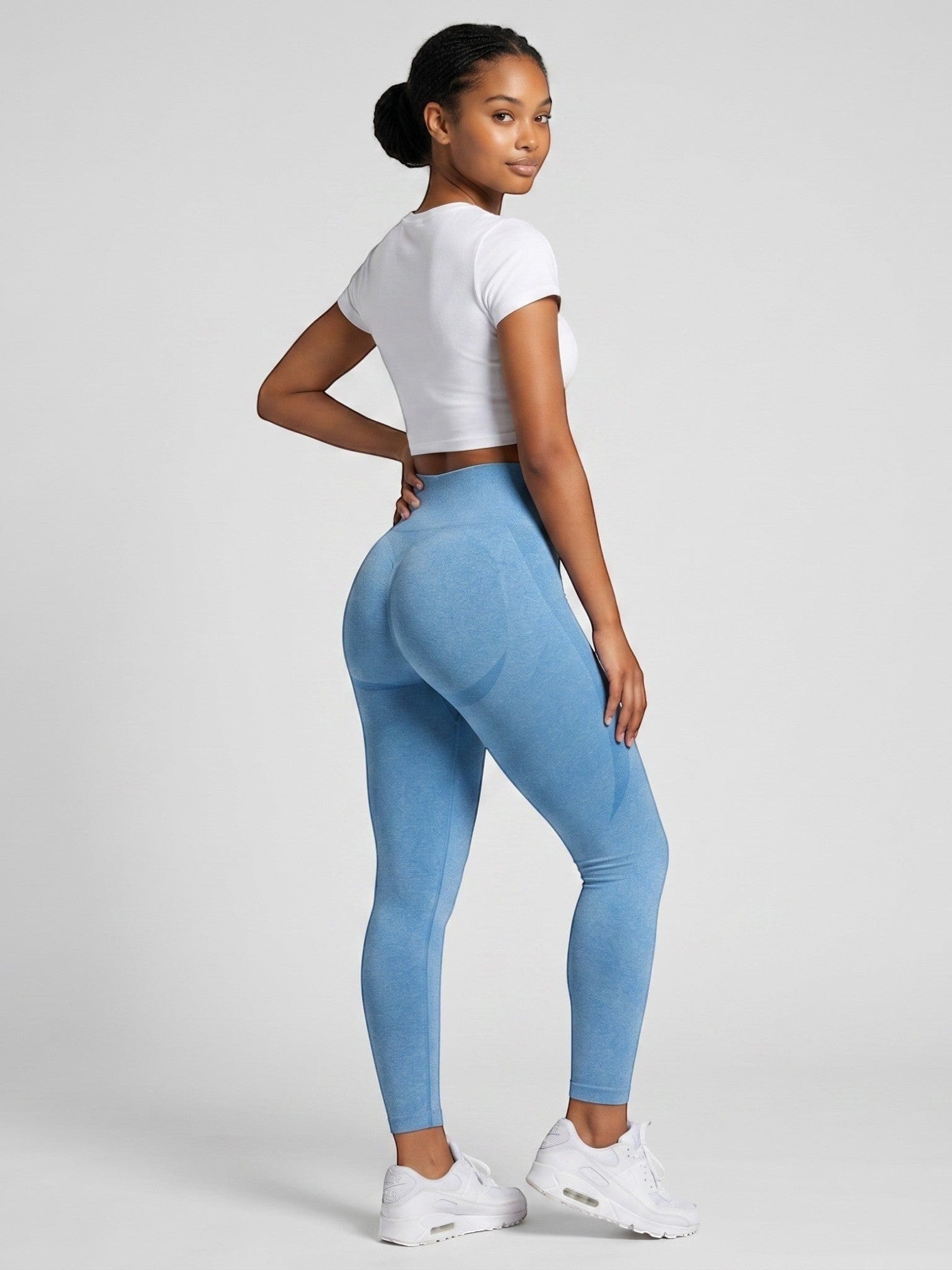 bys-store-3136505-215991 blue seamless high waist gym leggings with booty contouring design on a model