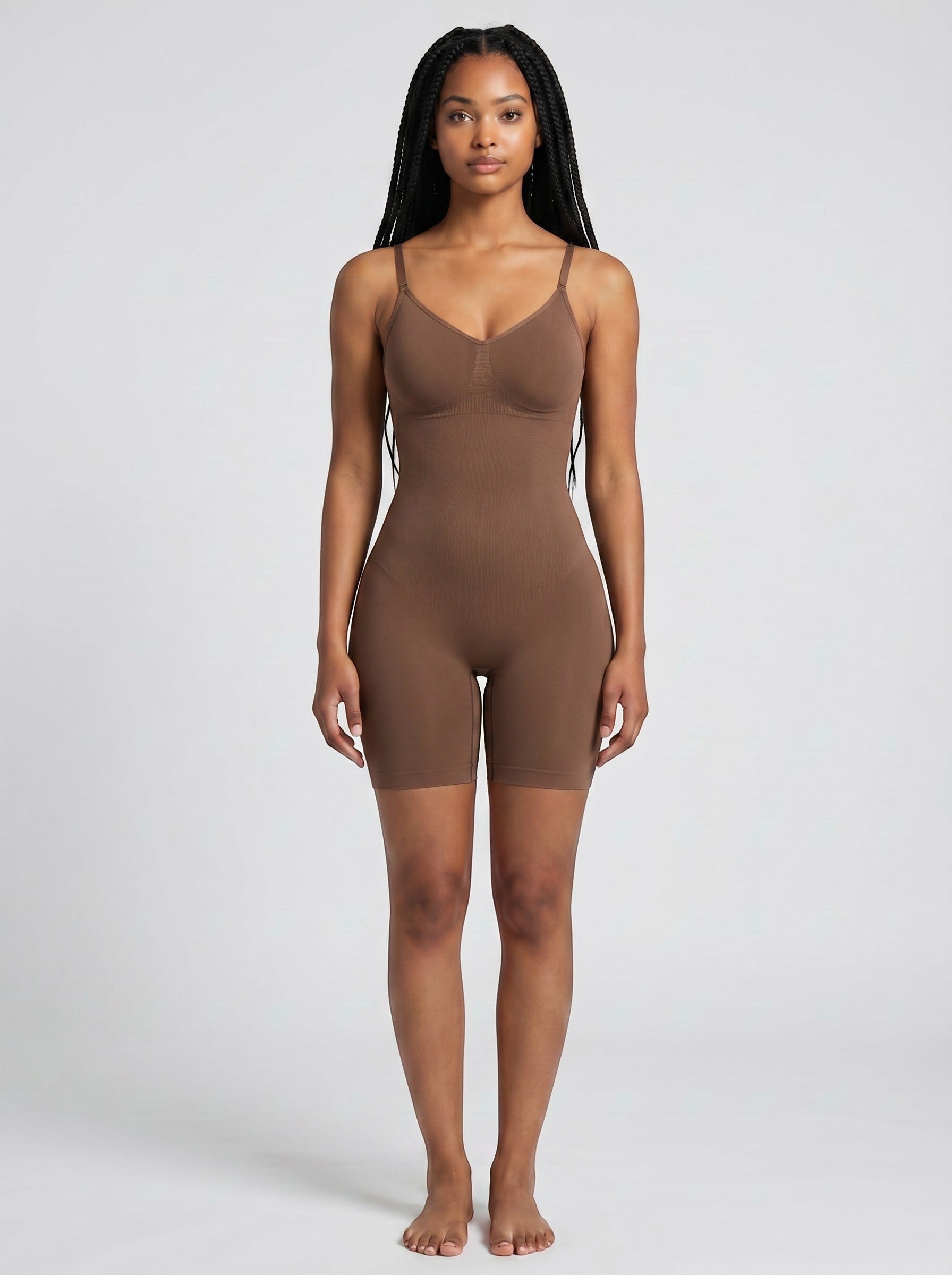 Model wearing a brown bys-store-3136505-215991 FormFit seamless bodysuit with tummy control and thigh smoothing.