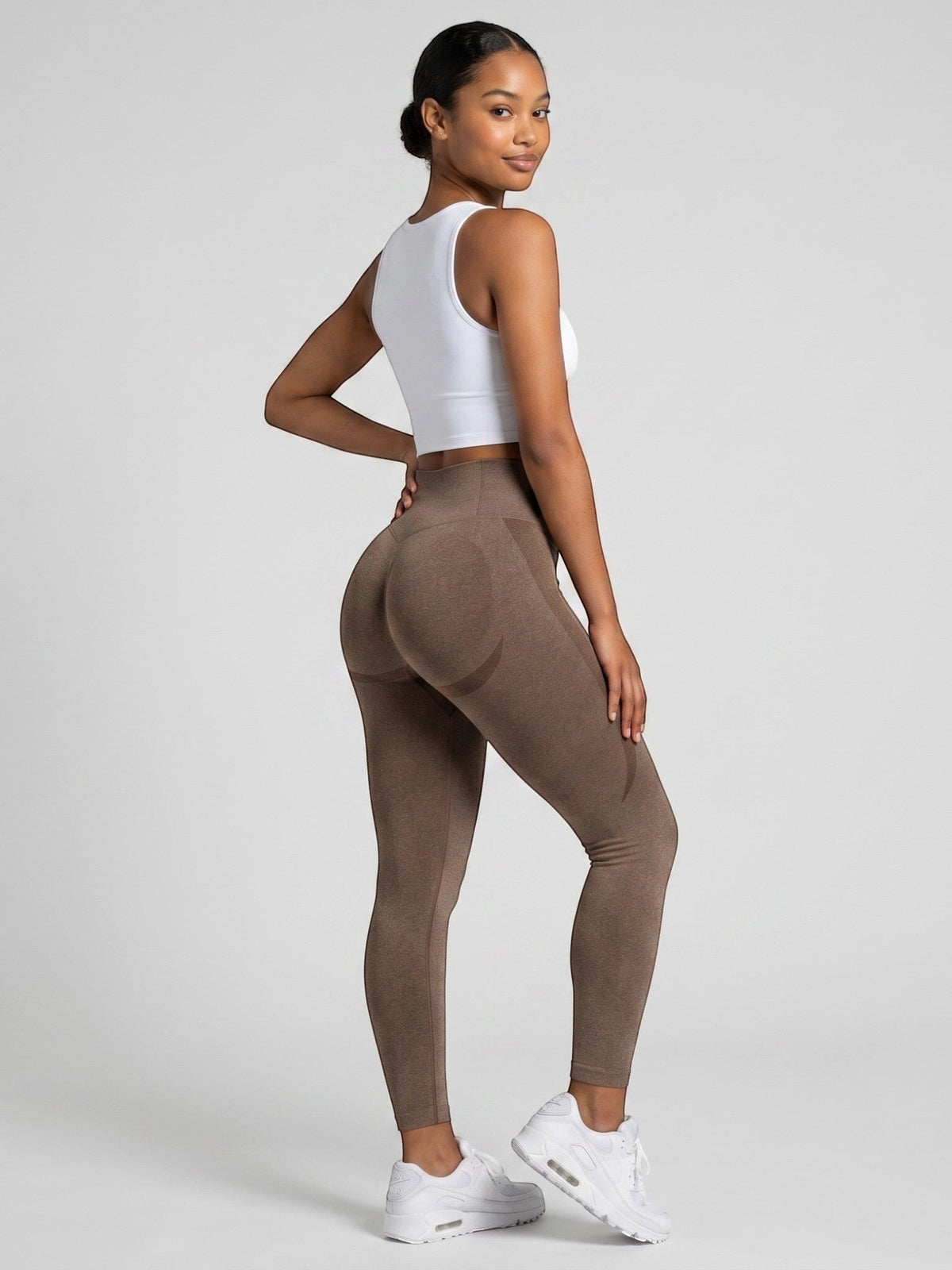 bys-store-3136505-215991 brown seamless high-waist gym leggings with booty contouring worn by a woman