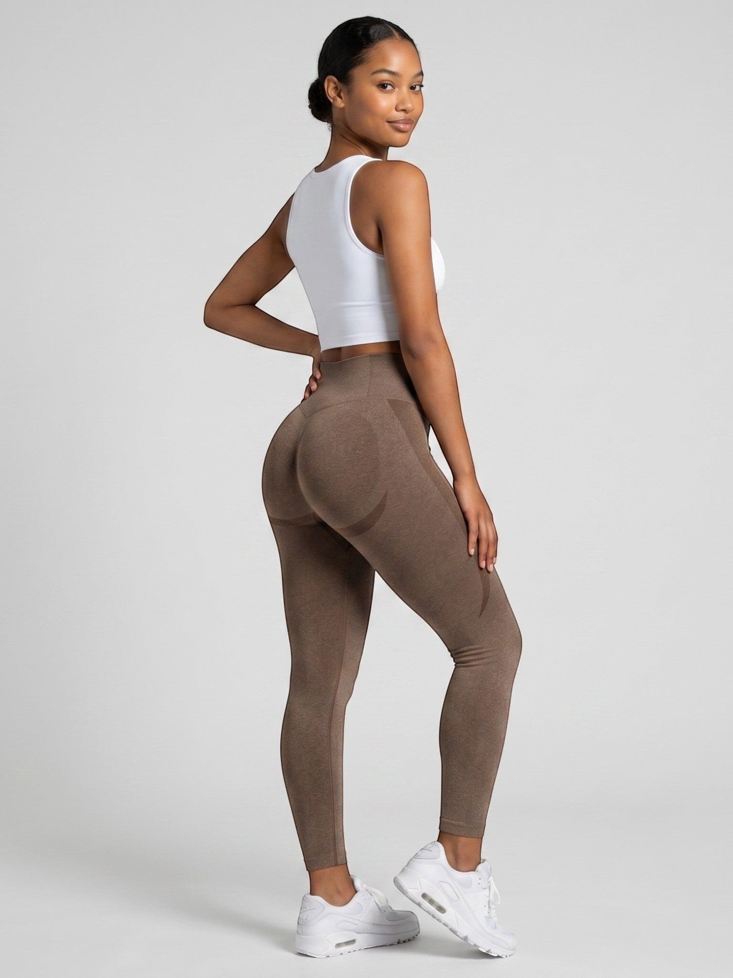 bys-store-3136505-215991 brown seamless high-waist gym leggings with booty contouring worn by a woman