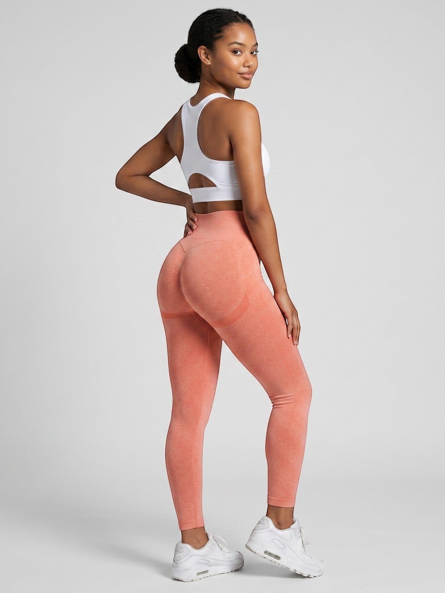 Model wearing bys-store-3136505-215991 seamless coral high-waist gym leggings with butt-lifting contouring design.