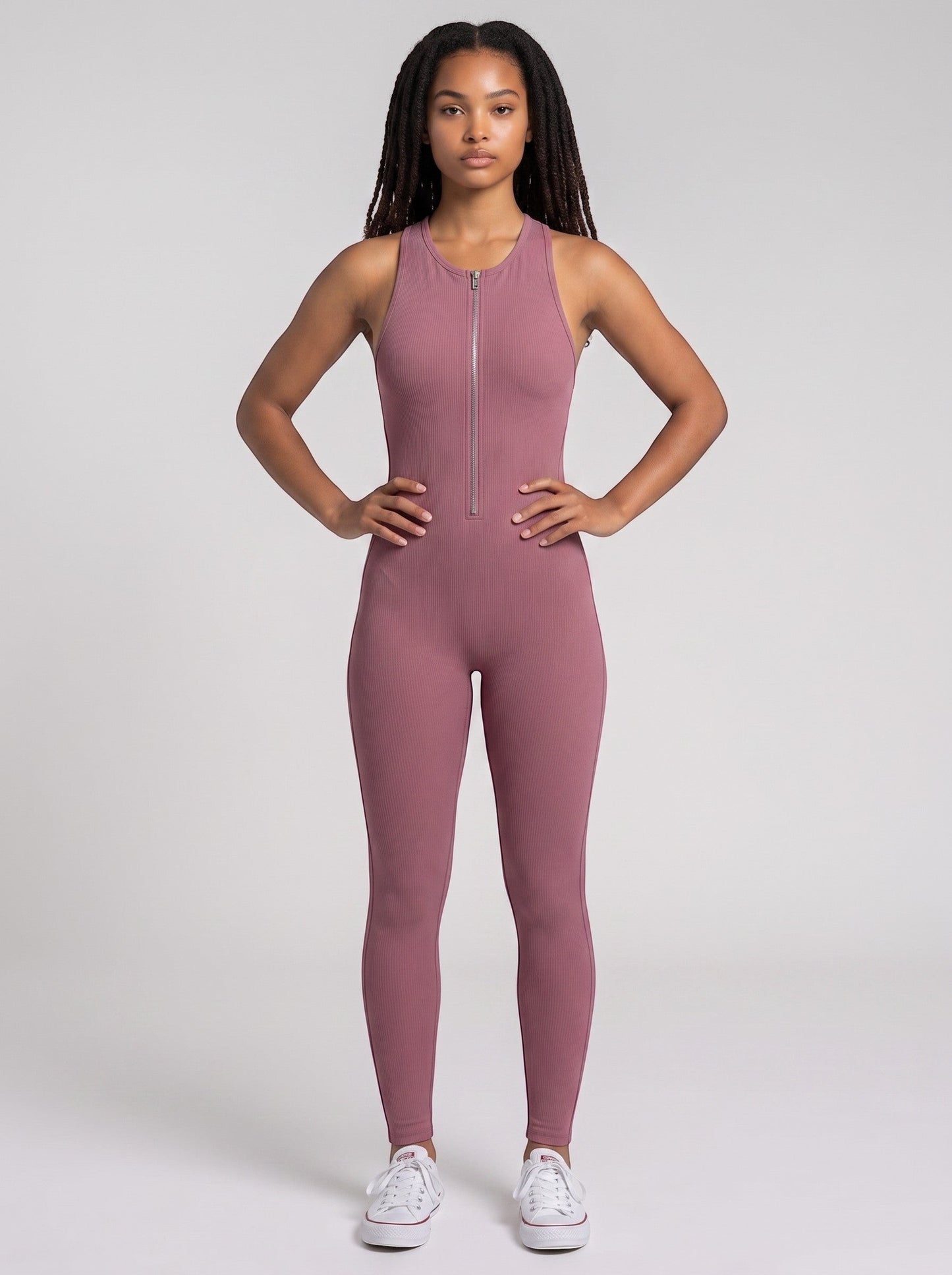 Model wearing a mauve ribbed SculptFit Bodysuit by bys-store-3136505-215991 with a front zipper and racerback design.