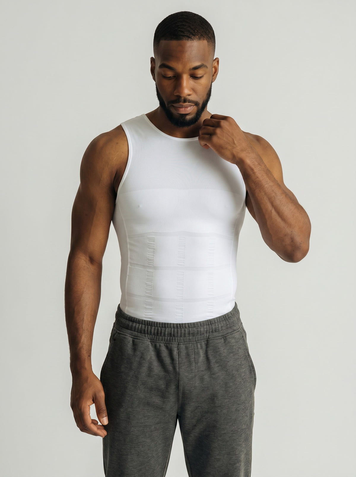 bys-store-3136505-215991 SlimVest men's white compression shirt providing a smooth silhouette and stomach support.