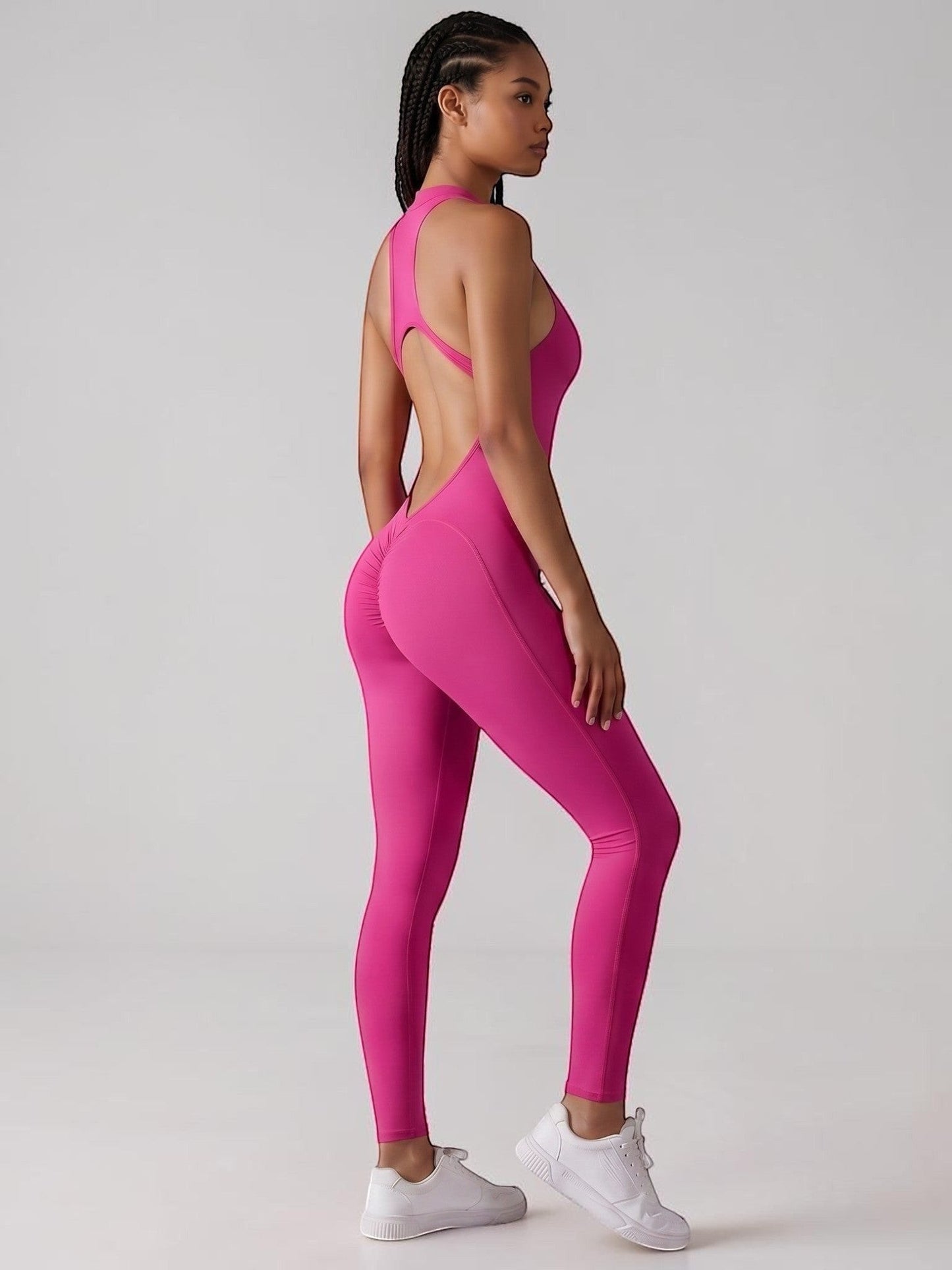 bys-store-3136505-215991 SculptFit hot pink open-back bodysuit with butt lifting design for gym and yoga