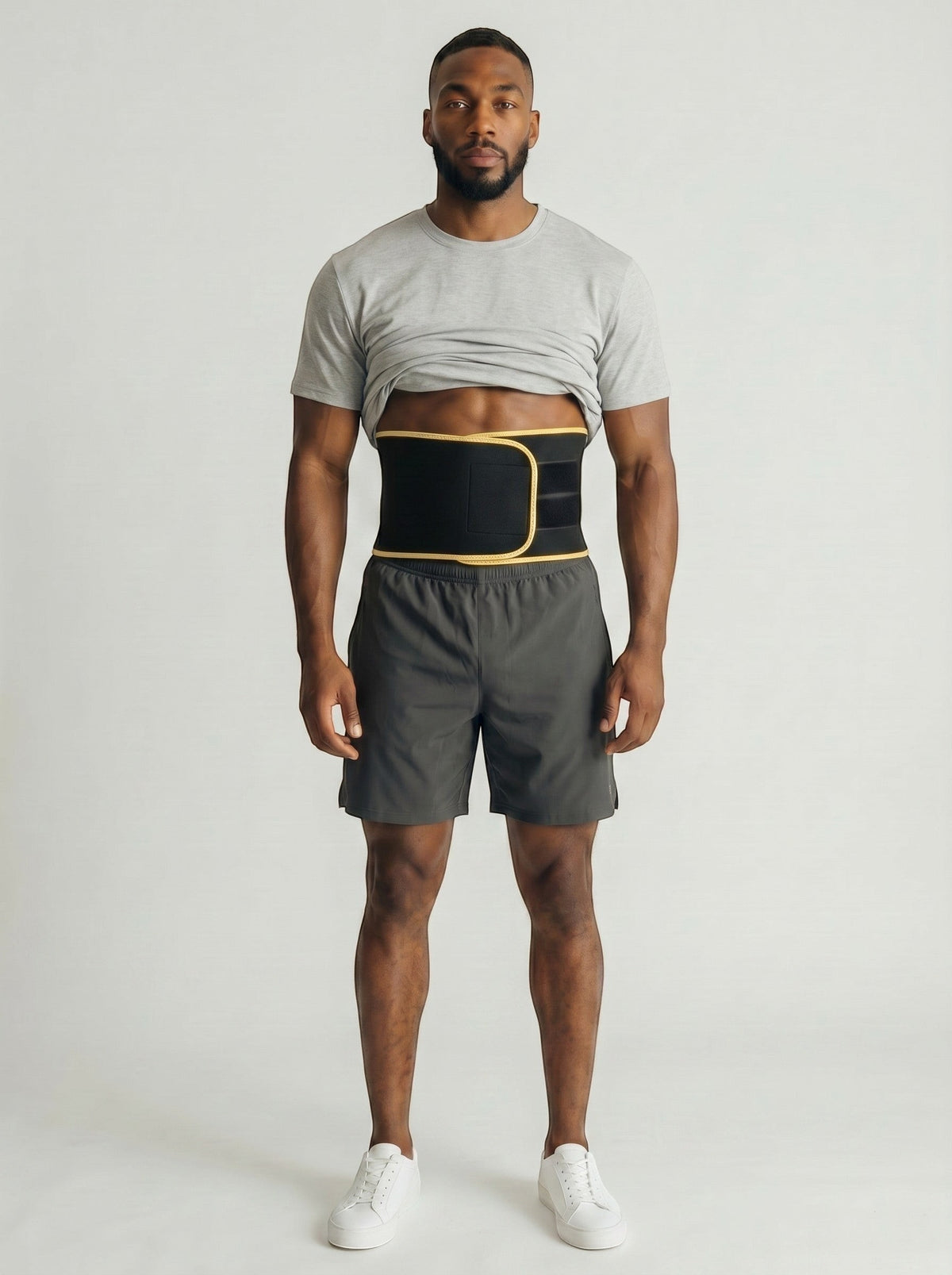 bys-store-3136505-215991 ThermoCore waist trimmer belt in black with yellow trim worn by a man in workout gear